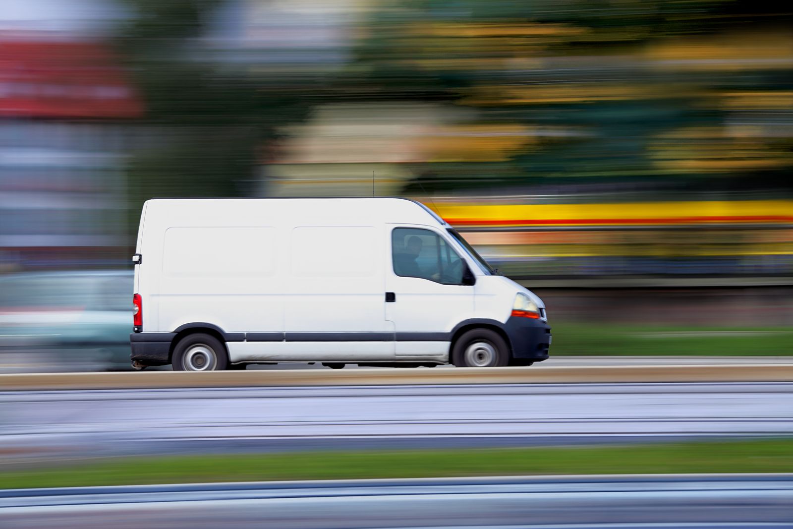 Blur white van panning and move Mansfield Moving Van Accident Lawyers